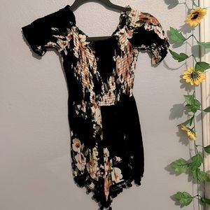 brand privy, color is black floral, size small